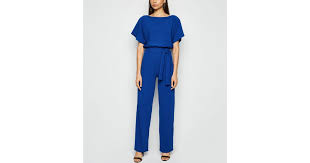 Missfiga Blue Batwing Tie Waist Jumpsuit New Look Please see the description panel on the product page for accurate length measurements. missfiga blue batwing tie waist jumpsuit new look