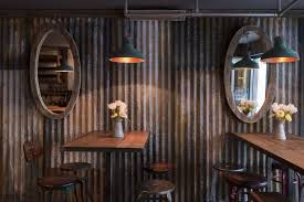 Ideal applications are walls, mansards and equipment screens. Just Opened Barnyard Rustic Restaurant Corrugated Metal Wall Reclaimed Wood Wall Decor