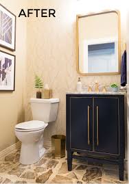 A slate blue floating vanity adds just the right amount of pizzazz to this otherwise neutral bathroom. Navy And Gold Powder Room Makeover Reveal Design Improvised