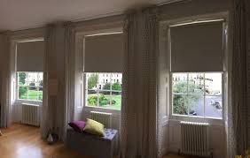 blackout roller blinds installed to