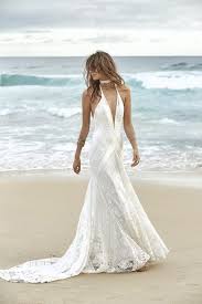 The cut shows off your shoulders and back, draws the eye upwards and balances out the body. 1001 Ideas For The Boho Beach Wedding Of Your Dreams