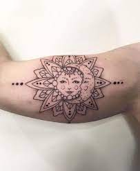 Tattoo By Christine Pexin Sun With Moon On Top Mandala Like Design With Dotwork Mandala Tattoo Design Mandala Tattoo Celestial Tattoo