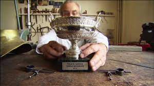 Djokovic possesses two french open crowns, nine at the australian open titles, five wimbledon championship victories, and three us open wins. French Open Winners Get Replica Trophy Cnn Video