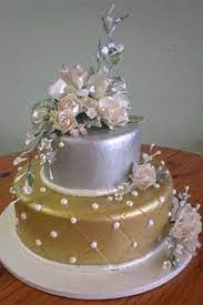 Small Two Tier Silver And Gold Cake Decorated With White Pearl Buttercream Beading And Gorgeous Silk Flor Wedding Cakes With Cupcakes Wedding Cake Cookies Cake