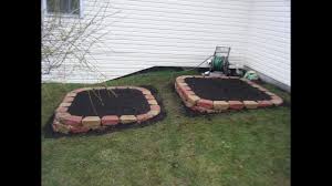 Draw a curve by setting a string at a center point and marking an arc with paint. A Raised Garden Bed Retaining Wall Project Youtube