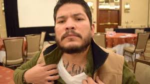 Mark gonzalez is listed as a gang member in police databases, has not guilty tattooed on his chest and is hoping to bring reform to corpus christi. Mark Gonzalez El Hispano Tatuado Que Rompe Cliches Como Fiscal De Distrito Chicago Tribune