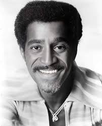 In 1959, the legendary Sammy Davis Jr. was captured in a striking  photograph by Burt Glinn, gazing out of a Manhattan window. This image  encapsulates not only the essence of a man