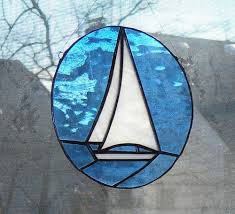 Create the lines for the faux stained glass by tracing around a small drinking glass or using a ruler to create straight lines onto the plastic lid. A Portfolio Of Stained Glass Windows By John Boyd Artist Run Website