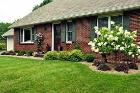 This front garden appears larger than it is as it's broken into two sections with clever paving that takes you on a walk. 28 Beautiful Small Front Yard Garden Design Ideas