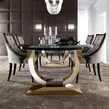 A remarkable work of east asian craftsmanship, this is ming lacquer ware furniture at its best; Italian Black Lacquered Gold Oval Dining Set Juliettes Interiors