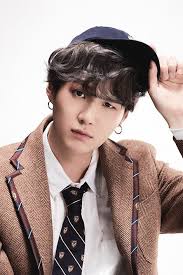 Taehyung wearing knitted vests — a well needed thread Bts Member Suga Wore Rm S Cardigan From Run On His Youtube Broadcast Teen Vogue