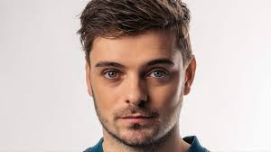 Martin Garrix dons his Ytram alias for the electro-pop banger 'Alive'