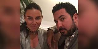 Carcharu dyn busnes o Fôn am naw mlynedd am dwyll gwerth miliynau o  bunnoedd