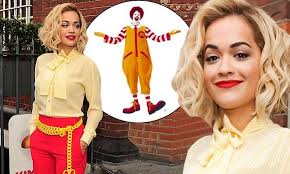 Rita Ora pays homage to Ronald McDonald with golden arches belt