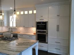 Shaker Style Full Overlay Sherwin Williams White Dove Lacquer Glass Upper Doors Island With Post Legs Custom Glass Used Kitchen Cabinets Glass Cabinet
