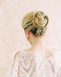 You can bun updo hairstyles for long hair have many faces: 34 Loose Wedding Updos For Brides With Long Hair Ruffled