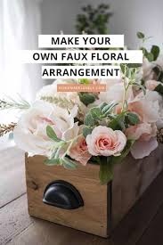 Transform dollar store flowers into tissue paper flowers to make them look chic. Diy Faux Floral Arrangement Feminine Yet Rustic Crate