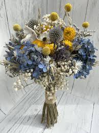 With a rich, peaceful overtone, filled with a level of joyous tranquility that no. Blue And Yellow Dried Flower Bridal Bouquet Dried Flower Arrangements Dried Bouquet Dried Flowers
