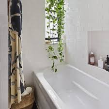 Royal blue bathroom with white slipper tub. Small Bathroom Design Ideas Popsugar Home