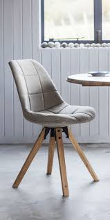 Light Grey Upholstered Chair With Wooden Legs In Scandinavian Style Great As A Dining Chair Dining Chairs Cheap Dining Chairs Scandinavian Dining Chairs