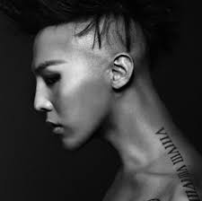 On his left chest, a tattoo of a dragon ball with eight stars. G Dragon Tattoos Neck Tattoos Gallery