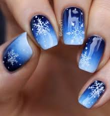 Gorgeous Blue And Snowflakes Nail Art Design Winter Nail Art Design Nail Designs Glitter Christmas Nail Art Designs Snowflake Nail Art Check out our website for gymnastics leotards, competition attire, and accessories!