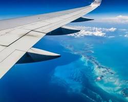 Image of plane flying over Costa Rica