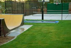 Pin By Ryan Lewis On Backyard Games And Activities Backyard Trampoline In Ground Trampoline Basketball Court Backyard