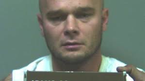 Man hit, choked pregnant woman, police say