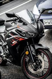 Blue And White Suzuki Sports Bike Parked During Daytime Photo Free Motorcycle Image On Unsplash Yamaha Sport Sport Bikes Bike Parking