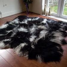 This stunning rug is elegant in its simplicity and is the perfect option for adding warmth, comfort, and style to any living space. Fibre By Auskin Artic Icelandic Sheepskin Six Pelt Rug Rugs Pelt Rugs White Area Rug