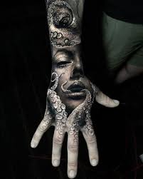 Squid Fingers Hand Tattoos For Guys Hand Tattoos Octopus Tattoo Design