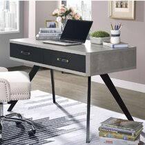 You just need to make the drawer itself, buy drawer slides, and figure out how to attach it to the desk. Concrete Desk Wayfair
