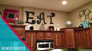 creative decorating above kitchen