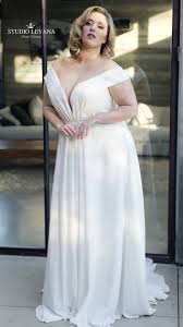 Plain Elegant Crepe Plus Size Wedding Dress With Deep V Neckline And Off Shoulder Sleeves Saar S Plus Size Wedding Gowns Plus Wedding Dresses Wedding Dresses