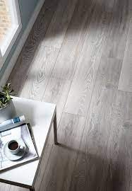 Our 3 Strip Grey Oak Flooring Provides Texture And Creates A Unique Look In Your Universal Kitchen The Universa Grey Laminate Flooring Gray Oak Floor Flooring