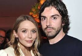 The actress, 32, spoke to kaley cuoco for variety's actors on actors series where she 'casually' dropped the news. Robbie Arnett Wiki Age Elizabeth Olsen S Boyfriend Bio Family Facts