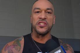 Cathy Kelley talks to Damian Priest backstage. Priest says he's the  consequences that people have to face when they're out of line and that's  why he took out Aleister Black. Kit Wilson