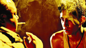 Jamal spits out a stream of. Slumdog Millionaire Opening Sequence Analysis The Film Blog