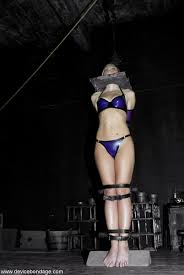 Immobile bondage girl Tabitha James in latex bikini gets her mound  stimulated
