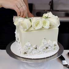 Arrangements to place on the backs of chairs. How To Put Fresh Flowers On A Buttercream Cake Chelsweets