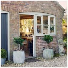Garage Door In Kitchen Black Garage Door White House Garageentrance Garageoverhang Prettygarage Want To Know More Hutte Fenster Hauswand Fassade Haus