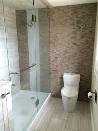 Glass Shower With A Solid Acrylic Base Pan Split Face Slate Accent Wall With Glass Tile Waterfall Effect Shower Base Fiberglass Shower Pan Shower Pan Tile