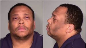 Charges: Cash, stolen gun found after man shot at driver