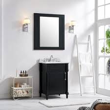 The vanity is topped with a glossy marble and includes a ceramic sink, but it's the abundance of storage that makes it irresistible. 24 Inch Vanities Bathroom Vanities Bath The Home Depot