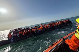 Mega dinghy' carrying 230 migrants across Channel shows crackdown is  working, says UK minister | The National