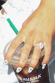 Ariana Grande Can T Deny Her New Tattoo Is About Pete Davidson Ariana Grande Tattoo Ariana Grande Nails Ariana Nails