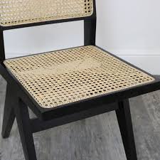 The chair is hand woven by skilled wicker workers. Black Teak Wood Rattan Chair