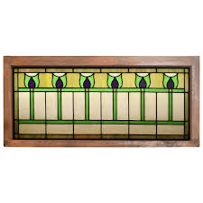 You can also opt for stained glass transoms made of recycled material; Purple And Green Tulip Flower Stained Glass Transom Window At 1stdibs