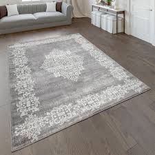 Damit tun sie dieser mischung aus schwarz und weiß unrecht. Teppich Wohnzimmer Kurzflor Mit Modernem Orientalischem Muster In Grau Weiss Kaufen Bei Diva Teppich Center